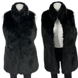 Faux fur vest black size large like new Banana Republic with pockets.